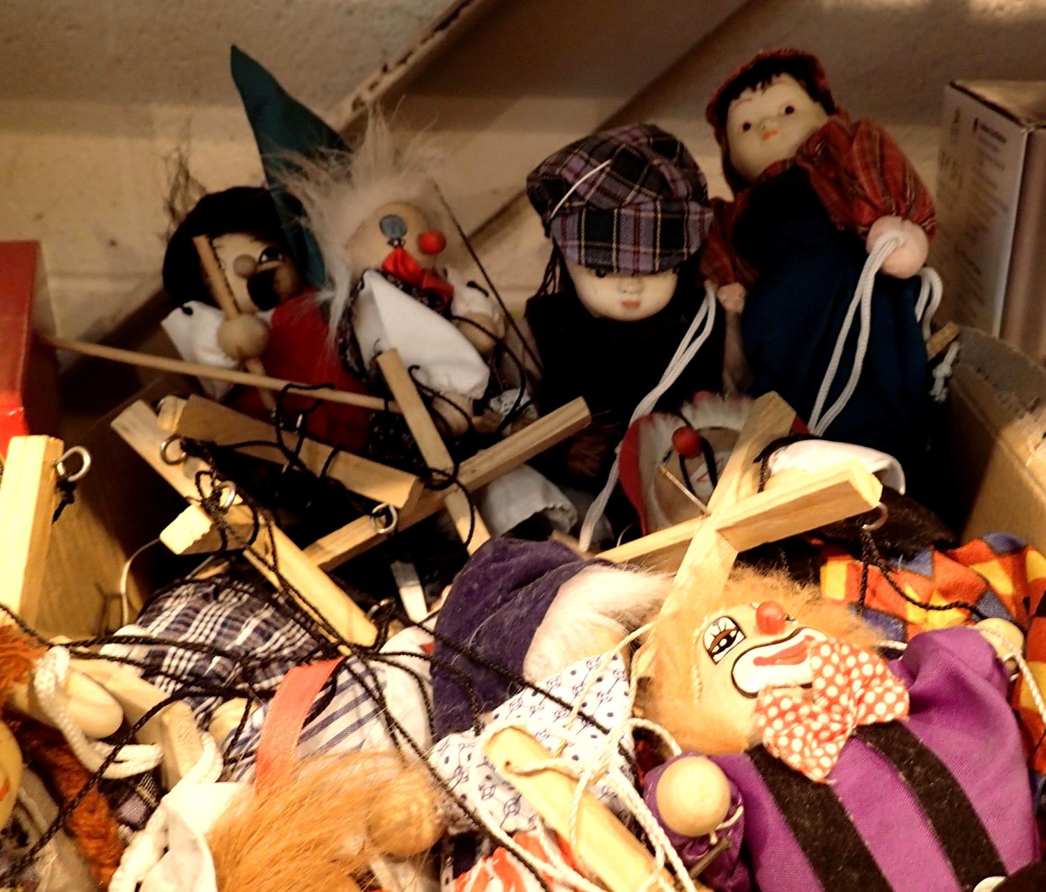 Box of vintage hand puppets and dolls comprising porcelain and rubber examples. Not available for