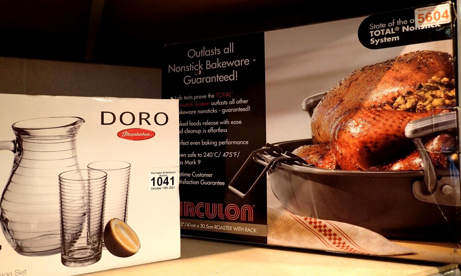 Doro seven piece glass beverage set, a boxed Circulon roasting dish with rack and an IKEA desk top