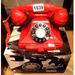Red, GPO Carrington, push button telephone in 1920s styling with pull-out pad tray; compatible