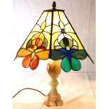 Tiffany style lamp on a turned onyx base, H: 50 cm. Not available for in-house P&P, contact Paul O'