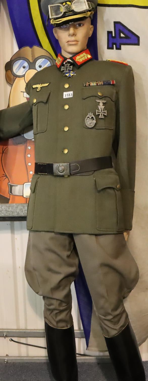 A museum arranged uniform of Erwin Rommel, comprising period and later pieces, including badged