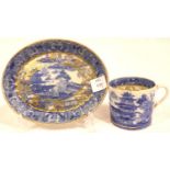 Antique Oriental blue and white Willow pattern dish and a similar mug with gilding. P&P Group 2 (£