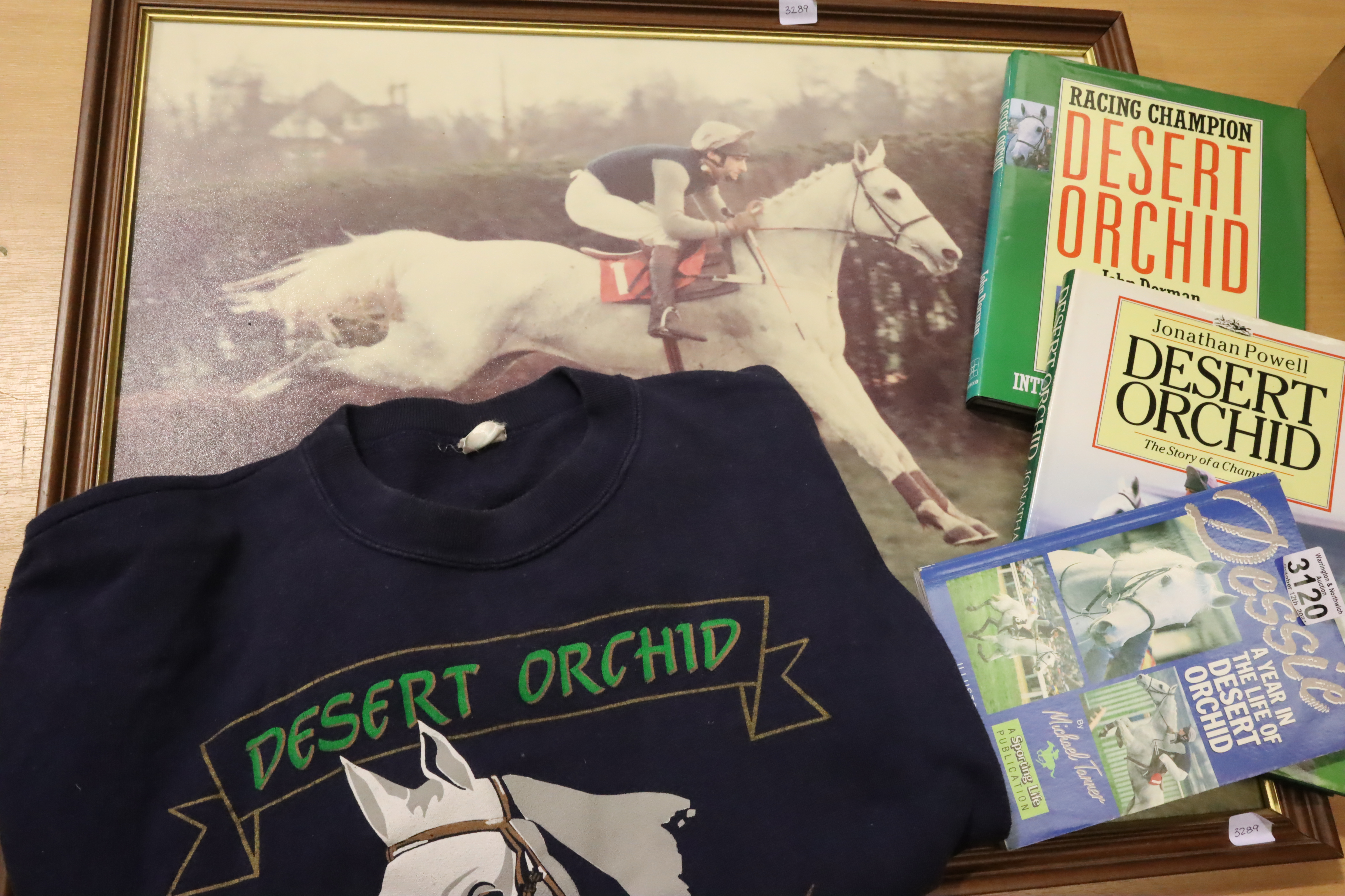 Simon Sherwood on desert orchid, a 1989 double signed publicity shot, framed, with jockeys sweater