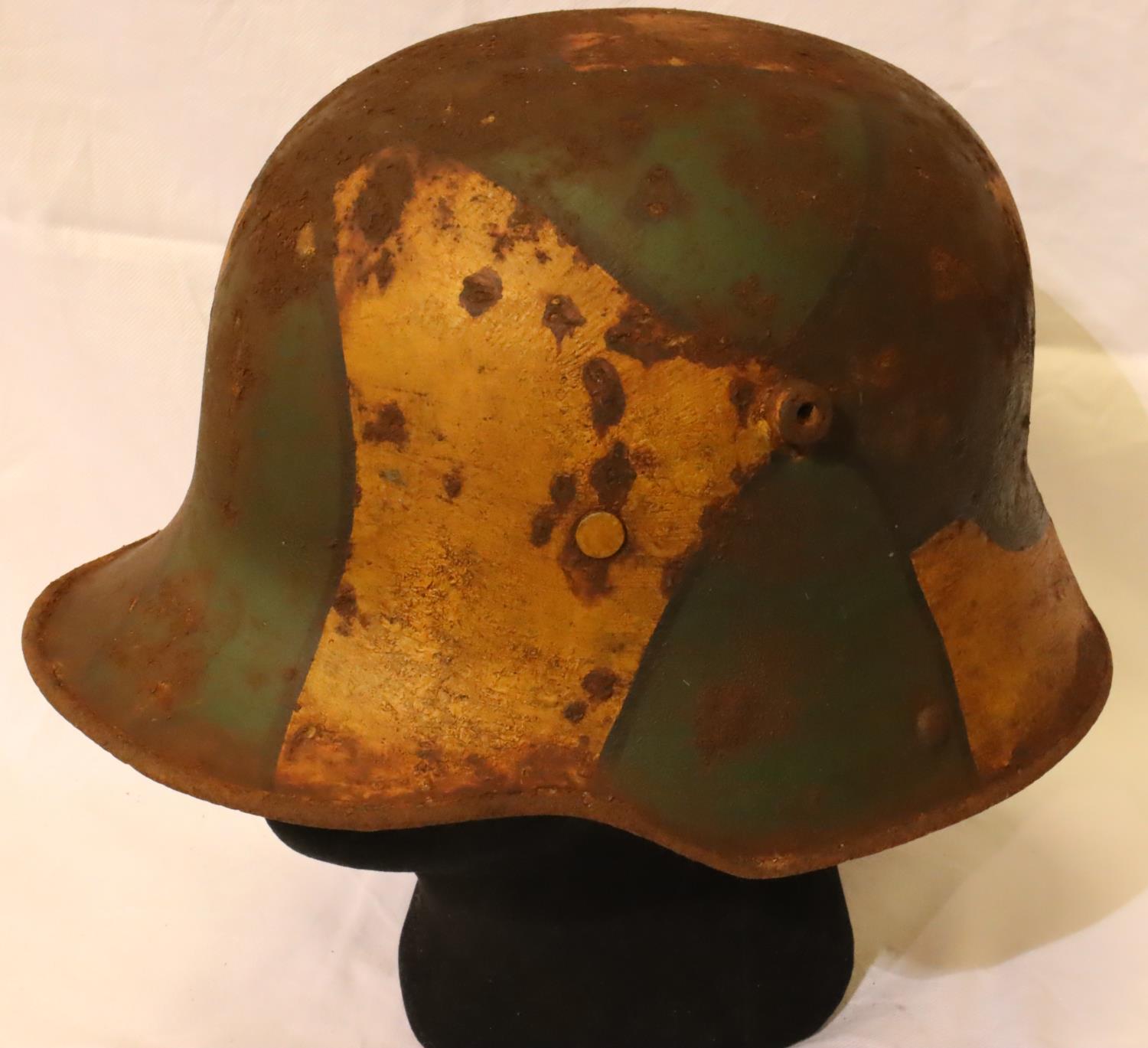 WWI 1916 German Stahlhelm helmet, painted in jigsaw pattern camouflage, complete with leather liner.