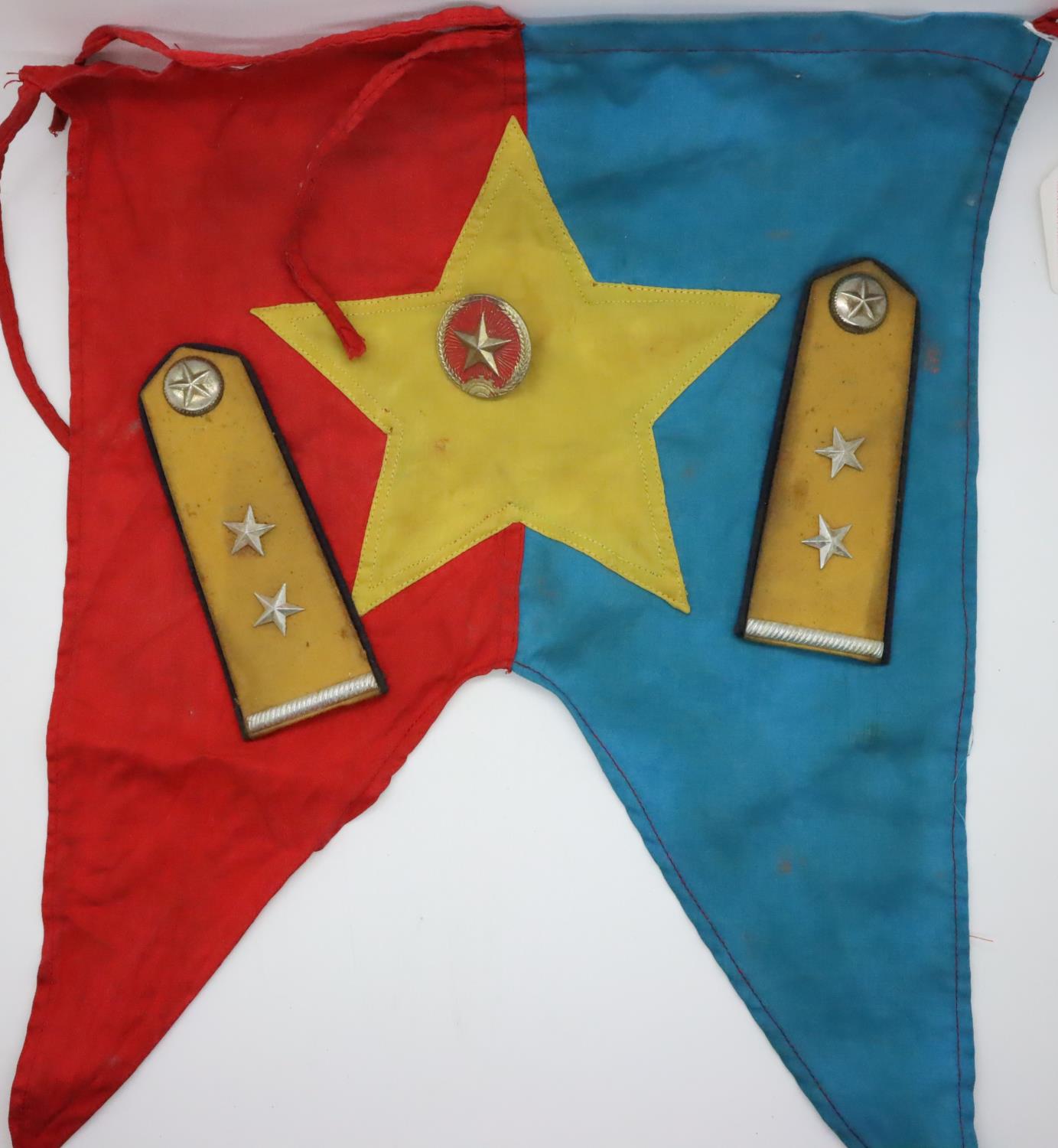 Vietnam War period NVA anti-aircraft unit shoulder boards, helmet plate and embroidered trumpet