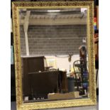 A substantial contemporary gilt framed rectangular mirror with bevelled glass, overall 132 x 103 cm.