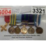 Six miniature military medals O.B.E parachute regiment. P&P Group 1 (£14+VAT for the first lot