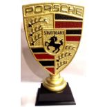 Gold coloured Porsche sign on base. Not available for in-house P&P, contact Paul O'Hea at