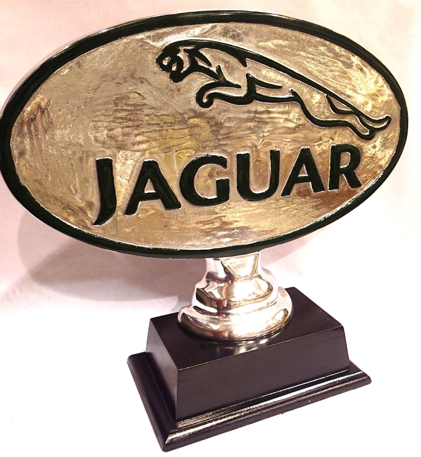 Chrome Jaguar sign on base. P&P Group 3 (£25+VAT for the first lot and £5+VAT for subsequent lots)