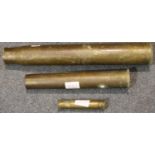 Three brass shell cases, tallest H: 42 cm. Not available for in-house P&P, contact Paul O'Hea at