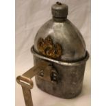 American WWI/WWII M1910 canteen with cup, mounted with an allied badge (unknown) semi relic
