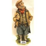 Capodimonte figurine, The Poacher, signed Tyche Brucke, H: 30 cm. P&P Group 3 (£25+VAT for the first