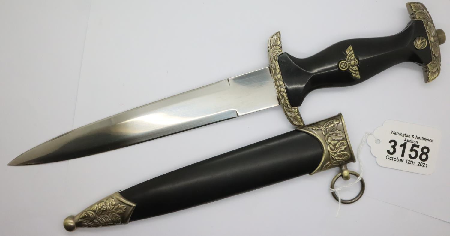 Contemporary SA ceremonial dagger copy with scabbard. P&P Group 2 (£18+VAT for the first lot and £