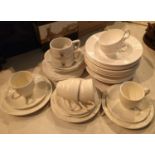 Mixed white part dinner and tea services including Shelley, Wedgwood and other examples. Not