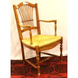 A 19th century elm framed elbow chair with rush seat. Not available for in-house P&P, contact Paul