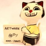 Lorna Bailey cat with board, H: 14 cm. No cracks, chips or visible restoration. P&P Group 1 (£14+VAT