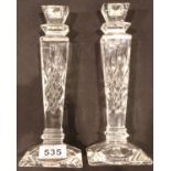 A pair of Stuart Crystal candlesticks, each H: 23 cm. No cracks, chips or visible restoration. P&P