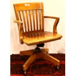 Walnut swivel office chair on castor supports. Not available for in-house P&P, contact Paul O'Hea at