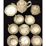 A Victorian tea service in the Worcester style, having eight cups and saucers, teapot, sugar and