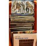 Quantity of mixed singles, mainly 1980s, including picture sleeves, approximately 70. Not