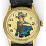 1960s childs cowboy wristwatch with revolver to seconds hand. Working at lotting. P&P Group 1 (£14+