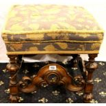 Early 19th century carved walnut stool in the Carolen manner with upholstered seat, wooden base in