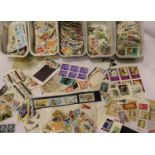 Collection of loose world stamps. Not available for in-house P&P, contact Paul O'Hea at Mailboxes on