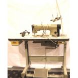 A Pfaff industrial sewing machine on treadle base. Not available for in-house P&P, contact Paul O'