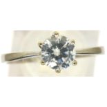 9ct white gold topaz solitaire ring, size P/Q, 1.7g. P&P Group 1 (£14+VAT for the first lot and £1+