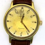 Omega; Geneve mechanical gents wristwatch with gold plated case, new Omega strap and baton chapters.