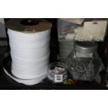 Two rolls of continuous zip, zip fasteners and accessories. P&P Group 3 (£25+VAT for the first lot