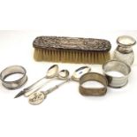 Collection of mixed household silver including three napkin rings, smelling salts bottle, three