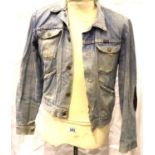 A vintage Wrangler denim jacket in well worn condition, size 38. P&P Group 2 (£18+VAT for the