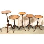 Five 19th/20th century mahogany tripod lamp tables, largest H: 69 cm. Not available for in-house P&