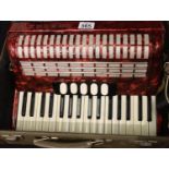 Hohner Concerto IIIS accordion in heavy case. P&P Group 3 (£25+VAT for the first lot and £5+VAT