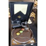 Vintage cased portable gramophone by HMV with three tins of needles. Not available for in-house P&P,