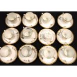 Royal Copenhagen set of twelve gilt coffee cans and saucers, no chips, cracks or visible