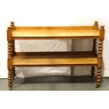 A late Victorian golden oak two tier buffet on twist supports and brass castors, 123 x 47 x 83 cm H.