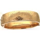 Hallmarked 9ct gold wax filled snap bangle, D: 5.5 cm 33.0g. P&P Group 1 (£14+VAT for the first