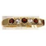 9ct gold garnet and topaz ring, size N, 1.4g. P&P Group 1 (£14+VAT for the first lot and £1+VAT