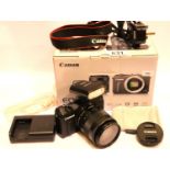 Canon EOS M Kit Boxed- contains Canon digital camera, zoom lens EF-M18 55mm f/3.5-5.6 IS STM,