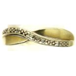 9ct gold crossover diamond set ring, size Q, 1.9g. P&P Group 1 (£14+VAT for the first lot and £1+VAT