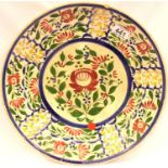 19th century Italian faience charger, D: 37 cm. 1 cm chip beneath rim, 1 cm chip to rim, crazed