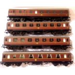 Four OO scale Hornby LMS maroon coaches; x1 all 1st class, x1 brake end, x2 all 3rd class. Very good