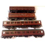 Four OO scale coaches; x2 LMS Clerestory roof, x2 BR maroon. One coupling missing, otherwise very