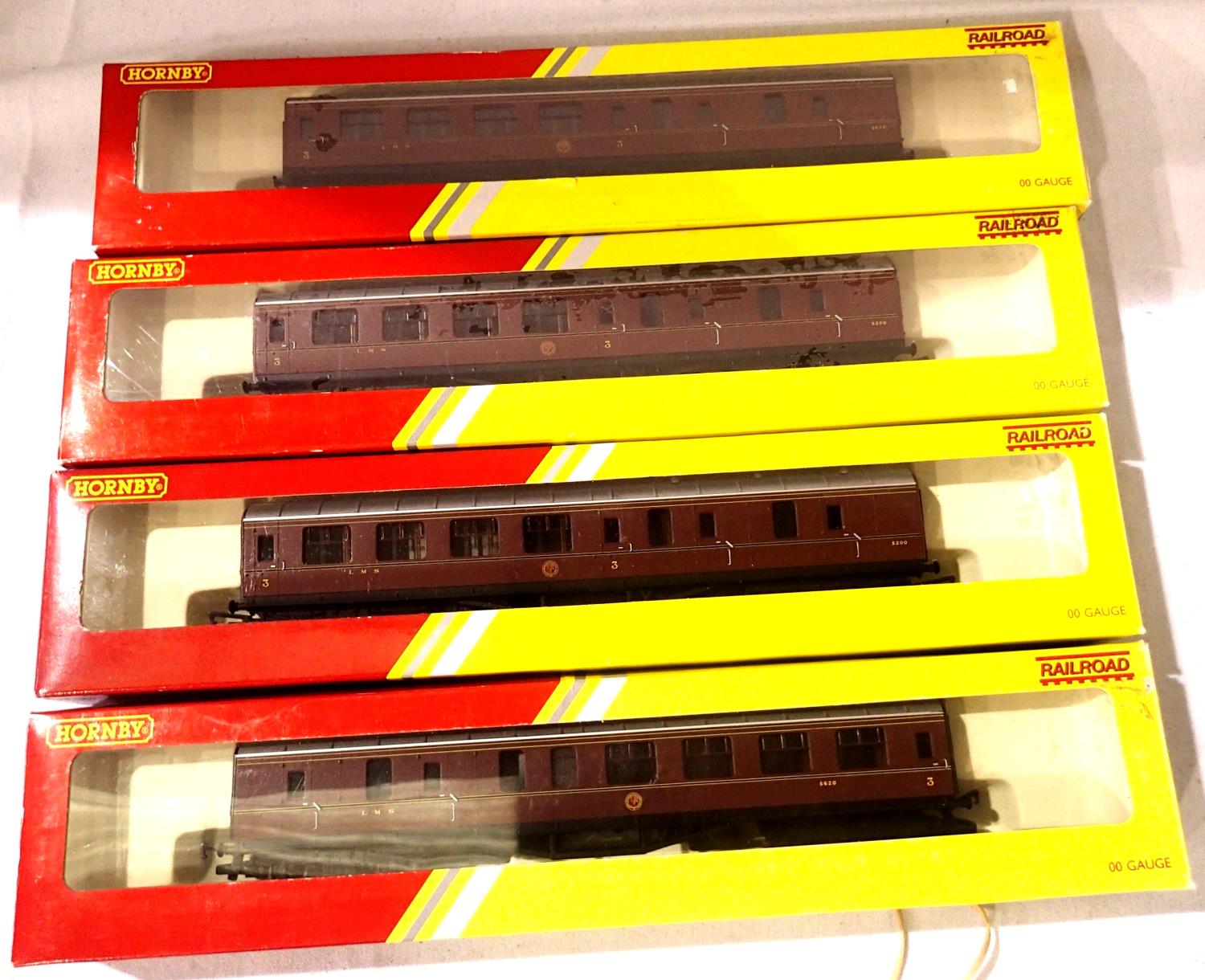Four Hornby OO LMS maroon coaches; R4389, R4389U x2 and R4232 - U01. All in very good - excellent