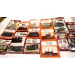 Collection of Wills plastic OO gauge building kits to include petrol station, coal hut, signal