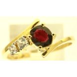 9ct gold ruby and topaz asymmetric ring, size U, 2.9g. P&P Group 1 (£14+VAT for the first lot and £