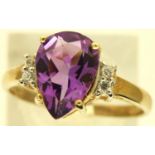 9ct gold pear cut amethyst ring, size O, 2.1g. P&P Group 1 (£14+VAT for the first lot and £1+VAT for