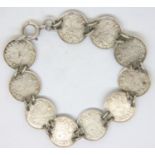 Silver bracelet with ten Queen Victoria 1881 threepences, 17g. P&P Group 1 (£14+VAT for the first